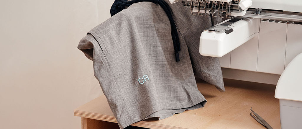 Tailoring of a men swim short with monogram Tailoring of a men swim short with monogram